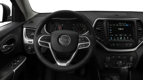 Car interior with board and steering wheel 2018 Jeep Cherokee Trailhawk Stock Footage 159970927