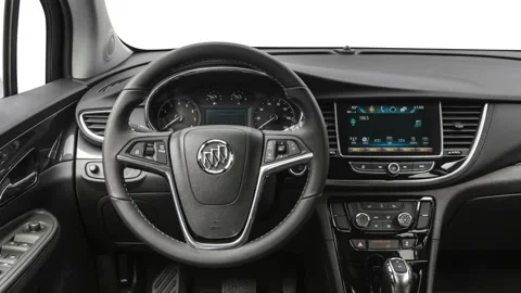 Car interior with board and steering wheel in studio 2019 Buick Encore Preferred Stock Footage 160021346