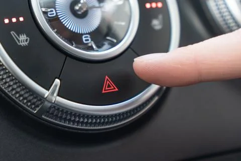Car Interior Controls Activating the Hazard Lights for Enhanced Safety and .. Stock Photos