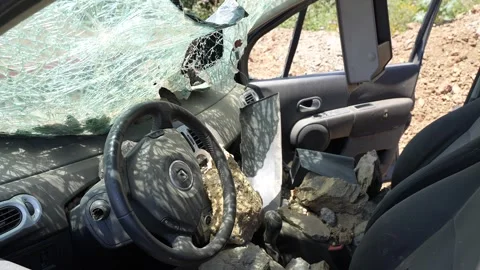 Car Interior Crushed by Falling Rocks After Severe Road Accident Stock-Footage 341624477