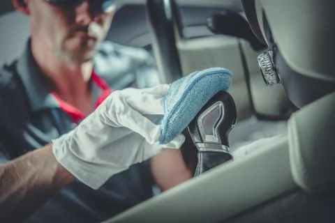 Car Interior Deep Cleaning by Professional Vehicle Detailing Worker. Stock Photos