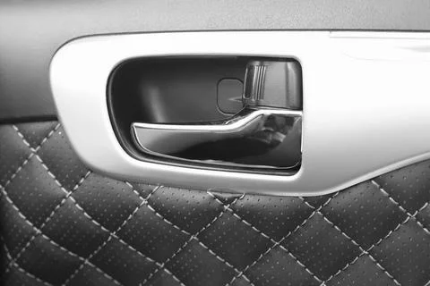 Car interior door handle. View inside the car Stock Photos