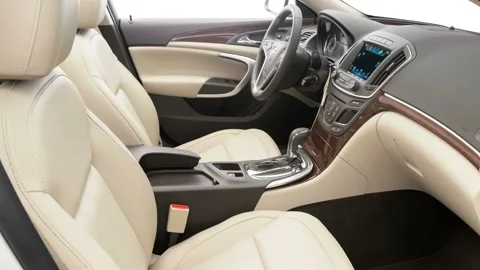 Car interior with front seats and board wide shot 2016 Buick Regal Regal Group Stock Footage 159852024