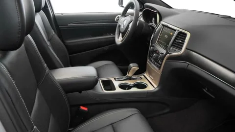 Car interior with front seats and board 2016 Jeep Grand Cherokee Limited Stock Footage 159875365