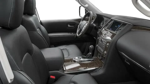 Car interior with front seats and board wide shot 2016 Infiniti QX80 Stock Footage 159881412