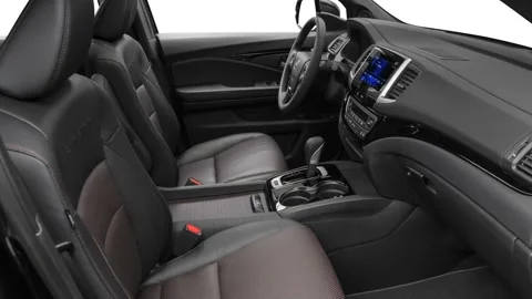 Car interior with front seats and board 2017 Honda Ridgeline Black Edition Stock Footage 159900899