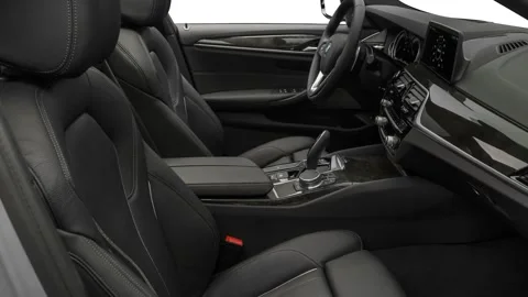 Car interior with front seats and board wide shot 2017 BMW 5-series 540i Stock Footage 159939307