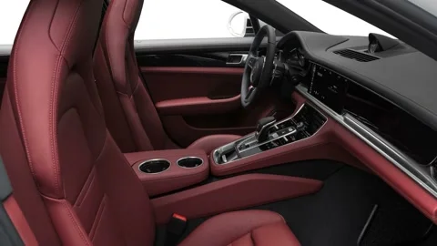 Car interior with front seats and board wide shot 2017 Porsche Panamera 4S Stock Footage 159943556