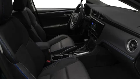 Car interior with front seats and board wide shot 2018 Toyota Corolla SE Stock Footage 159970247