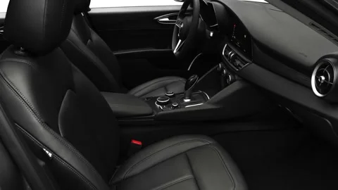 Car interior with front seats and board wide shot 2018 Alfa Romeo Giulia SE Stock Footage 159982930
