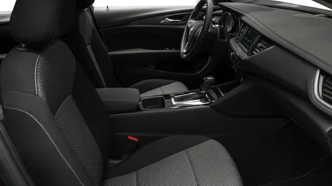 Car interior with front seats and board 2018 Buick Regal Sportback Preferred Stock Footage 159995670