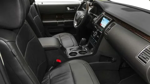 Car interior with front seats and board wide shot 2019 Ford Flex Limited Stock Footage 160020730