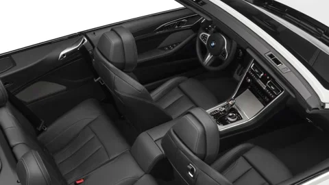 Car interior with front seats and board wide shot 2019 BMW 8-series M850i xDrive Stock Footage 160068119