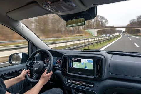 Car Interior With GPS Navigation And Highway Overpass Stock Photos