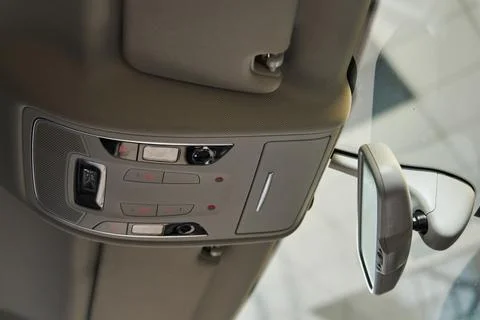 Car interior lighting, buttons on the ceiling, light bulbs, eyeglass case, rear Foto stock
