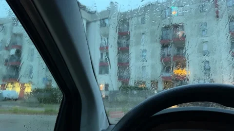 Car interior with rain outside Video stock 230298167