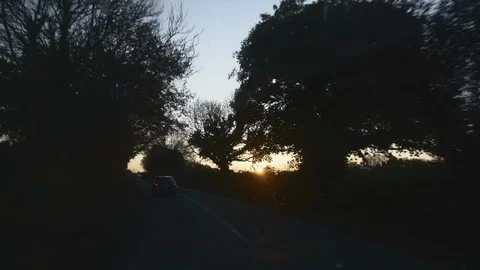 CAR INTERIOR on the road during sunset. UNDEREXPOSED Stock Footage 127405888