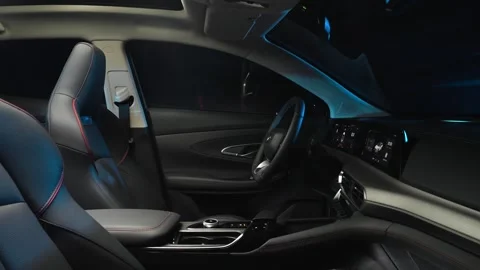 Car interior shot in a black studio. Artificial lighting. Slow camera movement Stock Footage 273278479