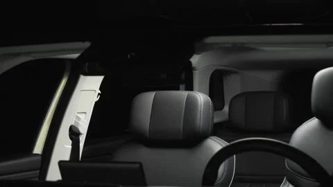 Car interior shot in a black studio. Artificial lighting. Slow camera movement Stock Footage 274431647