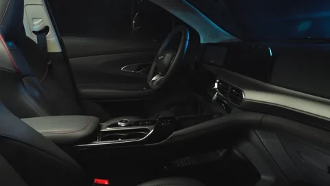 Car interior shot in a black studio. Artificial lighting. Slow camera movement Stock Footage 274431677