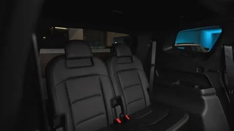Car interior shot in a black studio. Artificial lighting. Slow camera movement Stock Footage 274431793