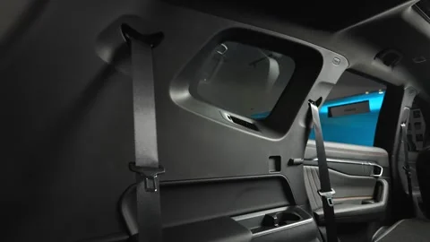 Car interior shot in a black studio. Artificial lighting. Slow camera movement Stock Footage 274431825