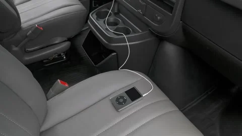 Car interior with smartphone  2016 GMC Savana 3500 Passenger Extended 1LS Stock Footage 159855962