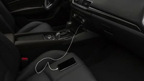 Car interior with smartphone  2018 Mazda MAZDA3 Grand Touring Stock Footage 159966448