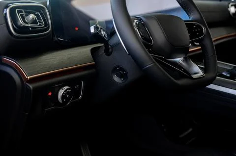 Car interior - steering wheel, shift lever and dashboard. Car modern inside. Stock Photos