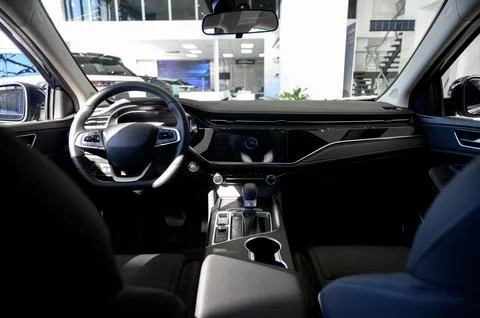 Car interior - steering wheel, shift lever and dashboard. Car modern inside. Stock Photos