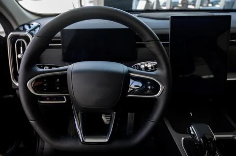 Car interior - steering wheel, shift lever and dashboard. Car modern inside. Stock Photos