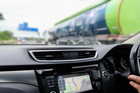 Car interior view from angle of driver on motorway Stock Photos