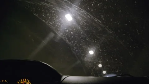 Car Interior View Driving Through an Illuminated Tunnel at Night Stock Footage 302219441