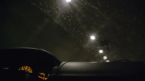 Car Interior View Driving Through an Illuminated Tunnel at Night Stockbeeldmateriaal 302219501