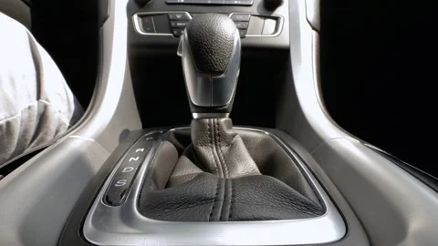 Car interior view with focus on gear shift mechanism and console design Stock Footage 325037643