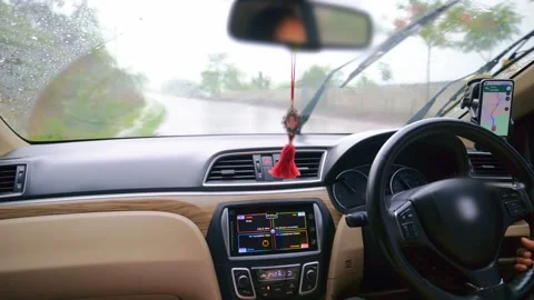 Car Interior View with Navigation During Rain Stock Footage 305956641