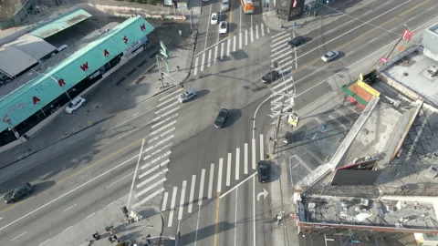 Car Intersection in Los Angeles, CA 4K,  Cars moving and people walking Stock Footage 237838753