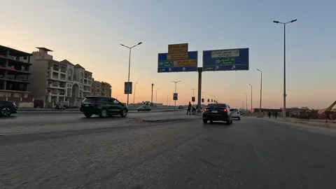 Car Journey Through Active City Neighborhood Streets New Cairo Showing Buildings Stock Footage 329783795