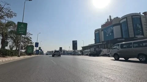 Car Journey Through Active City Neighborhood Streets New Cairo Showing Buildings Stock Footage 329812596