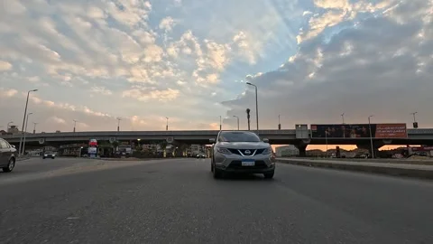 Car Journey Through Active City Neighborhood Streets New Cairo Showing Buildings Stock Footage 329895771