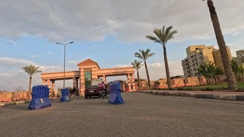 Car Journey Through Broad City Neighborhood Streets New Cairo Showing Buildings Stock Footage 329897555