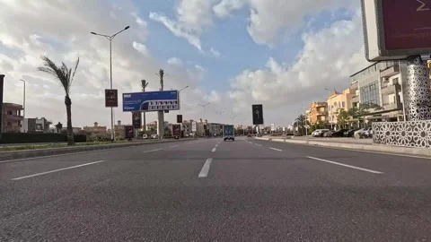 Car Journey Through Broad Roads New Cairo Showing Buildings Traffic Vehicles And Stock Footage 329657111