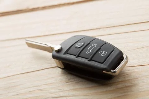 Car key and security remote on the table, concept for rent or buy a new car Foto stock