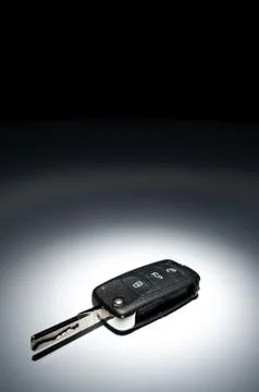 Car key on dark background Stock Photos