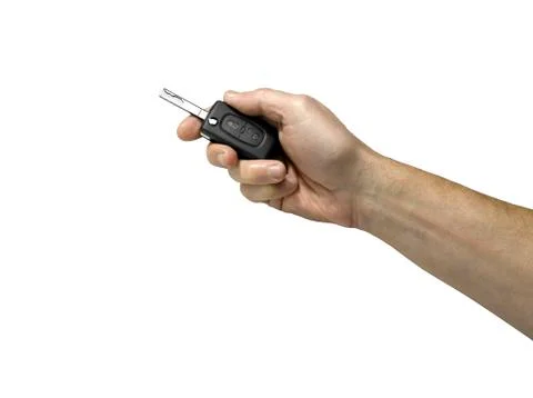 Car key in hand (clipping path ) Stock Photos