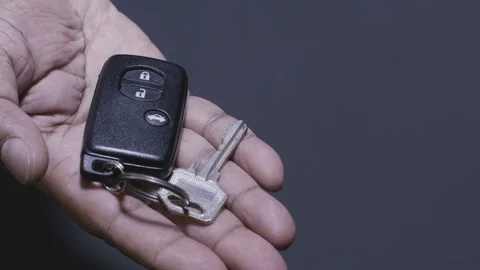 Car Key in Hand Video stock 131570019