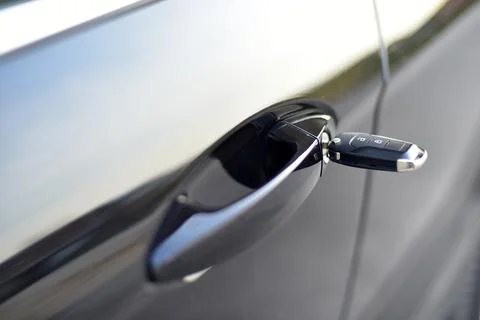 Car key inserted in lock Stock Photos