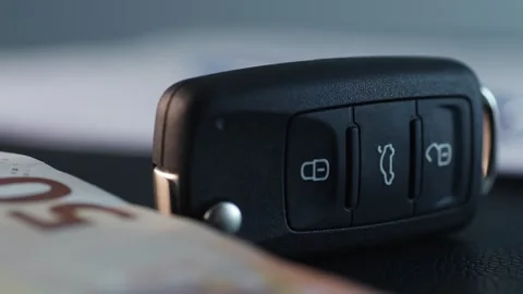 Car Key with money and signed documents. Stock Footage 270186970