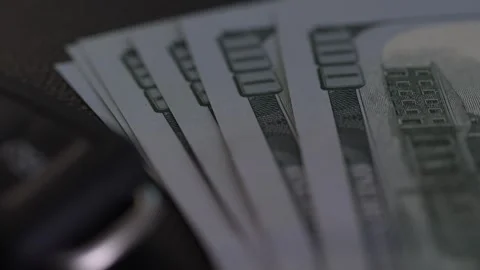 Car key next to a stack of money. Stock Footage 265855383