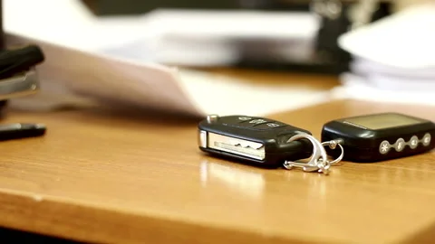 Car Key On Office Table Stock Footage 234812412